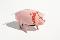 Porco Polly in latta con fiocco Porco Polly in latta con fiocco